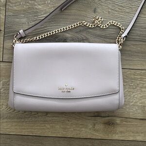 Lavender Kate Spade crossbody bag with gold chain detail